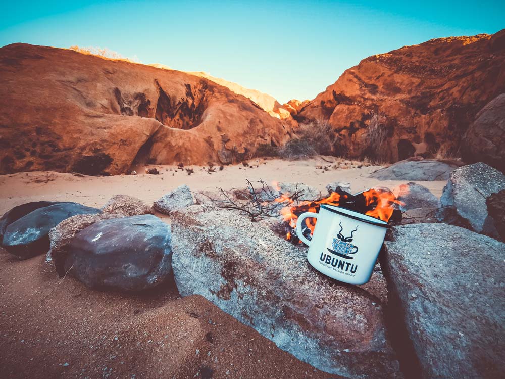 Travelling Ubuntu Koppie At Fire In Namibian Landscape